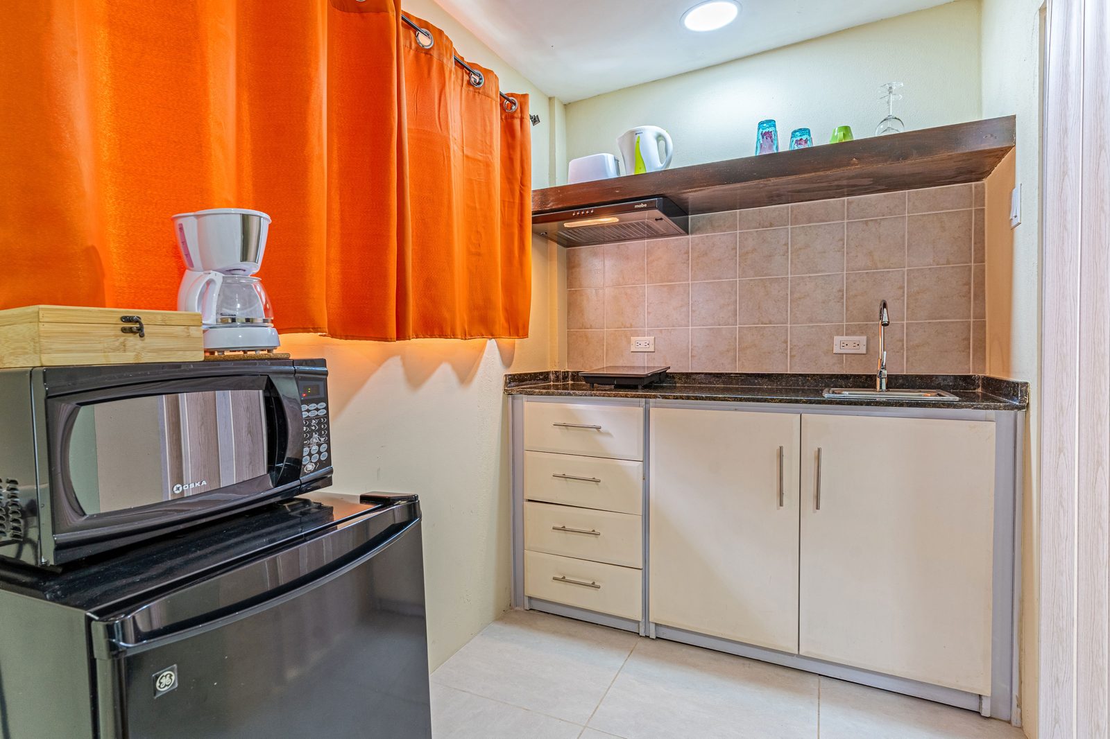 Apartment 6 · kitchenette and fridge